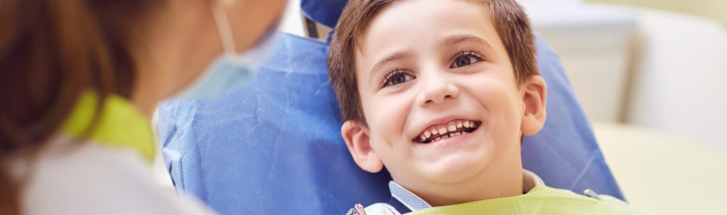 child with dentist